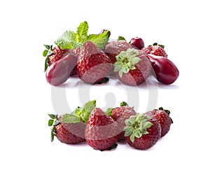 Ripe strawberries and red berries isolated on white background. Background of mix fruits with copy space for text.