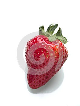 Ripe strawberry on white background