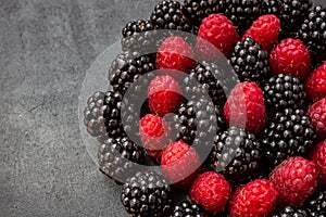 Ripe summer berries raspberries and blackberries