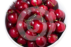 Ripe sweet red cherries in a bowl