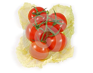 Ripe tomatoes on lettuce
