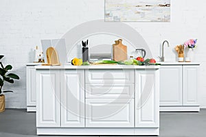 ripe vegetables on kitchen counter in light