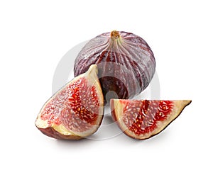 ripe whole fig and chopped pieces close-up isolated on white background
