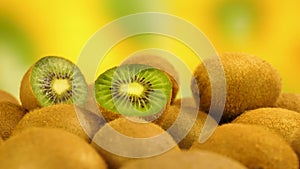 Ripe whole kiwi and half kiwi fruit