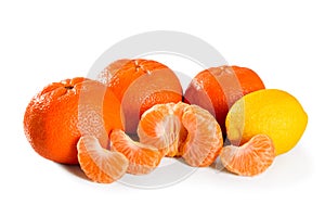 Ripe whole and peeled mandarin and lemon citrus fruit isolated on white background macro Close-up