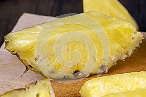 ripe yellow pineapple cut into pieces