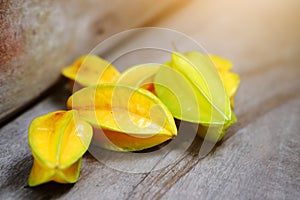 Ripe Yellow star fruit or star apple, Carambola on Wood floor