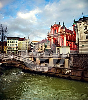 Riple Bridge with church and famous old buildings in Ljubljana, Slovenia