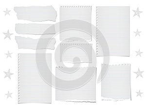 Ripped lined note, notebook paper strips, sheets for text or message stuck on white background with stars
