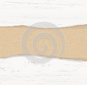 Ripped paper background on wood texture with area for copy space.