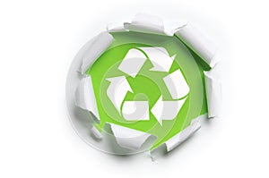 Ripped paper with recycle logo