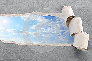 Ripped paper and sky