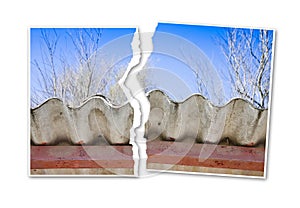 Ripped photo of a dangerous asbestos roof - concept image