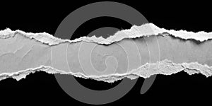 Ripped Torn Paper Edges Isolated on Black Background