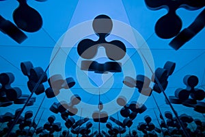 Ripple Currency Symbol With Many Mirroring Images of Itself