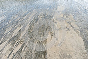 Ripple marks on sand beach
