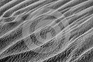 Ripple marks (wind ripples) on the sandy beach.