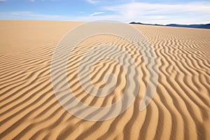 ripple patterns on the surface of sand dunes