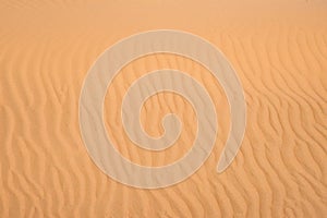 Ripple sand dunes texture background. Desert, sandy waves
