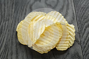 Rippled organic chips on wooden table