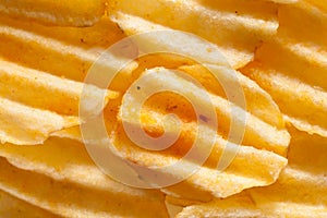 Rippled potato chips background