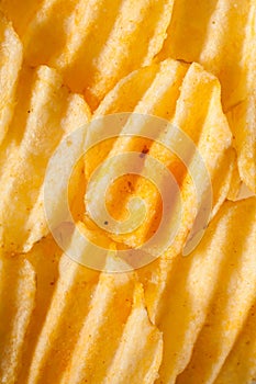 Rippled potato chips background