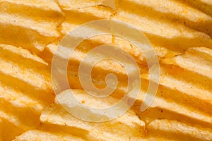 Rippled potato chips background