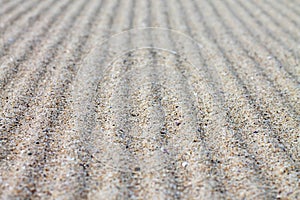 Rippled sand texture for background.