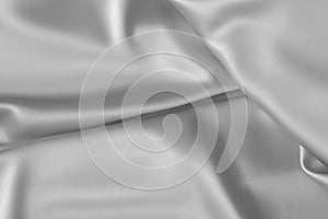 Rippled white silk fabric satin cloth waves background