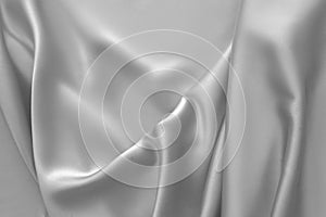 Rippled white silk fabric satin cloth waves background