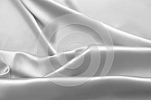 Rippled white silk fabric satin cloth waves background