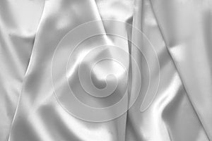 Rippled white silk fabric satin cloth waves background