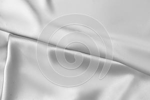 Rippled white silk fabric satin cloth waves background