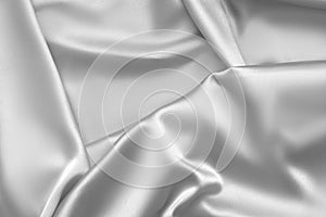 Rippled white silk fabric satin cloth waves background