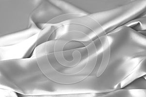 Rippled white silk fabric satin cloth waves background