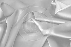 Rippled white silk fabric satin cloth waves background