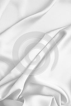 Rippled white silk fabric satin cloth waves background