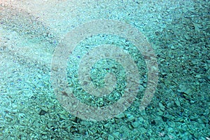 Ripples under turquoise water surface , the Ionian sea.