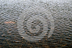 Ripples on water, calmness on river, view of reservoir from the shore