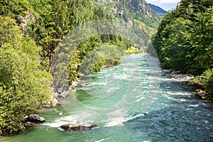 Rippling water of a river in the Alps