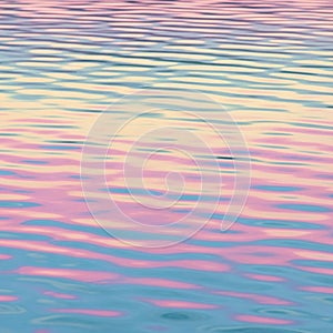 Rippling water surface reflecting a gradient