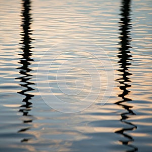 Rippling water surface with reflections of