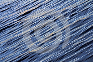 Rippling water surface with sunlight reflection. Color photo, background No. 4