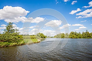 Rippling water surface in a wide Dutch creek