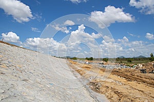 Riprap slope protection in a road construction project. Road slope protection from landslides, and floods.