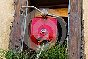 Riquewirh, France. Motorcycle model in a window