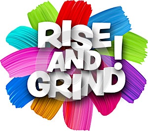 Rise and grind paper word sign with colorful spectrum paint brush strokes over white