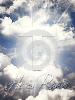 He is risen. Happy Easter. Cross in heavenly blue sky with clouds and sun rays