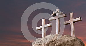 He is risen. Wood cross on sunset sky background with copy space for inscription. Jesus Christ Resurrection. Christian Easter