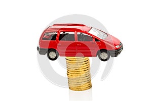 Rising car costs. car on coins